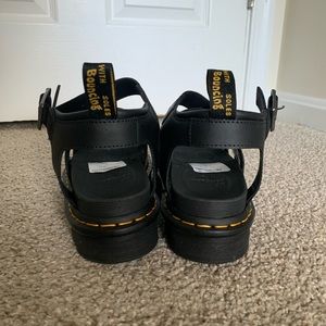 Dr. Martens sandals.